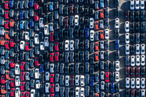 Lots of parked cars waiting to be shipped overseas